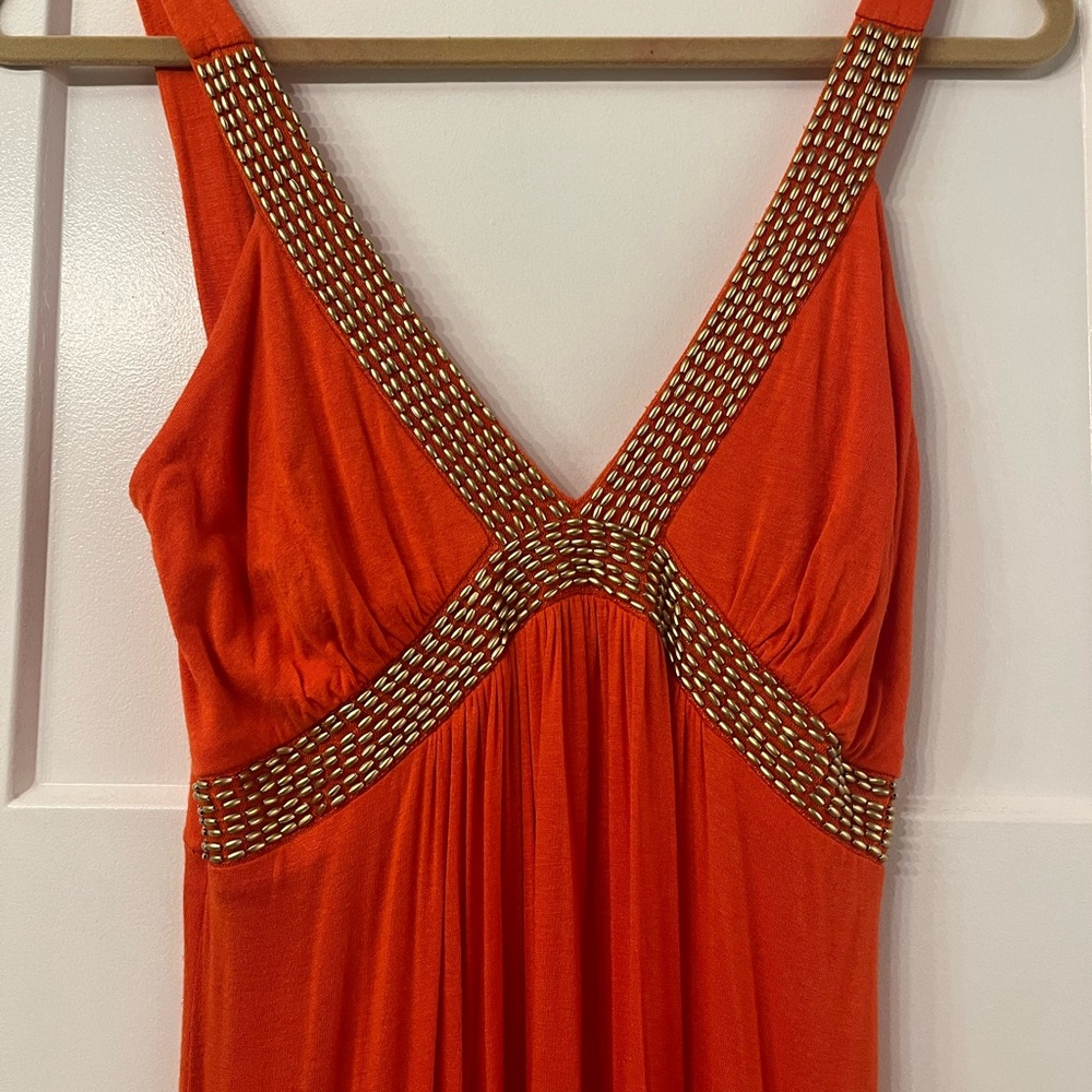 Orange maxi dress with gold neck details